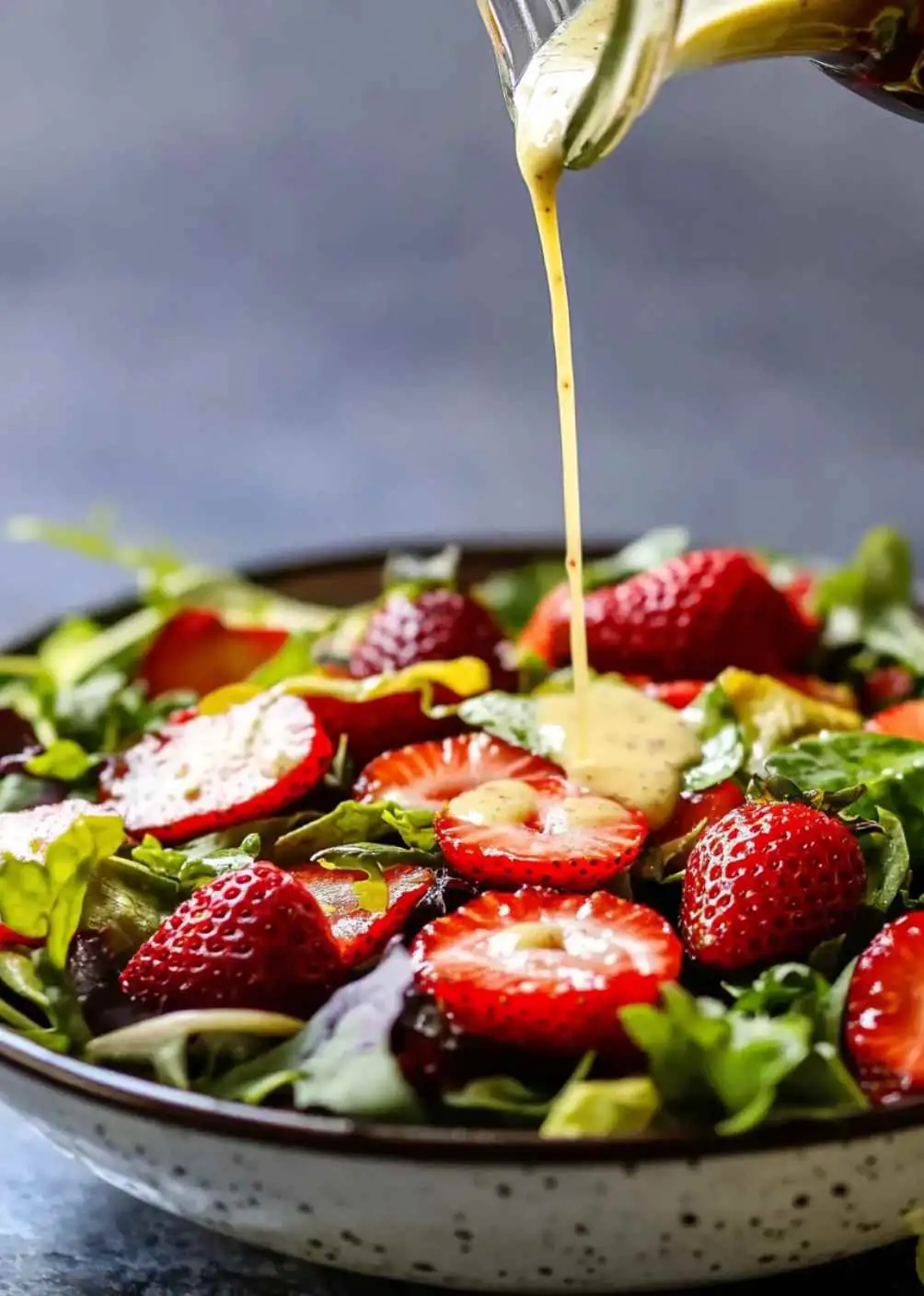 Plated Strawberry Salad Recipe with Cheese and Nuts Strawberry salad recipe on white plate with cheese and nuts